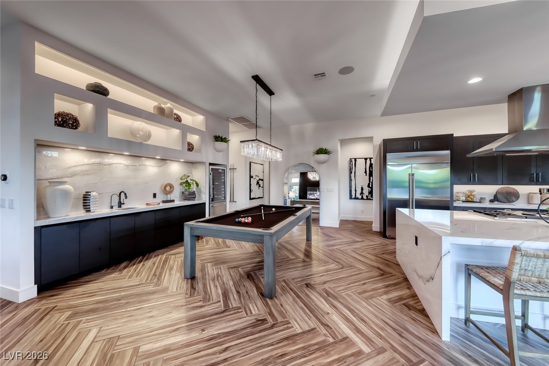 2216 Sky Pointe Ridge Drive Henderson, NV 89052 - Photo 15 of 79 This home has been upgraded with a dedicated wet bar, full size wine refrigerator, two beverage cooler drawers
