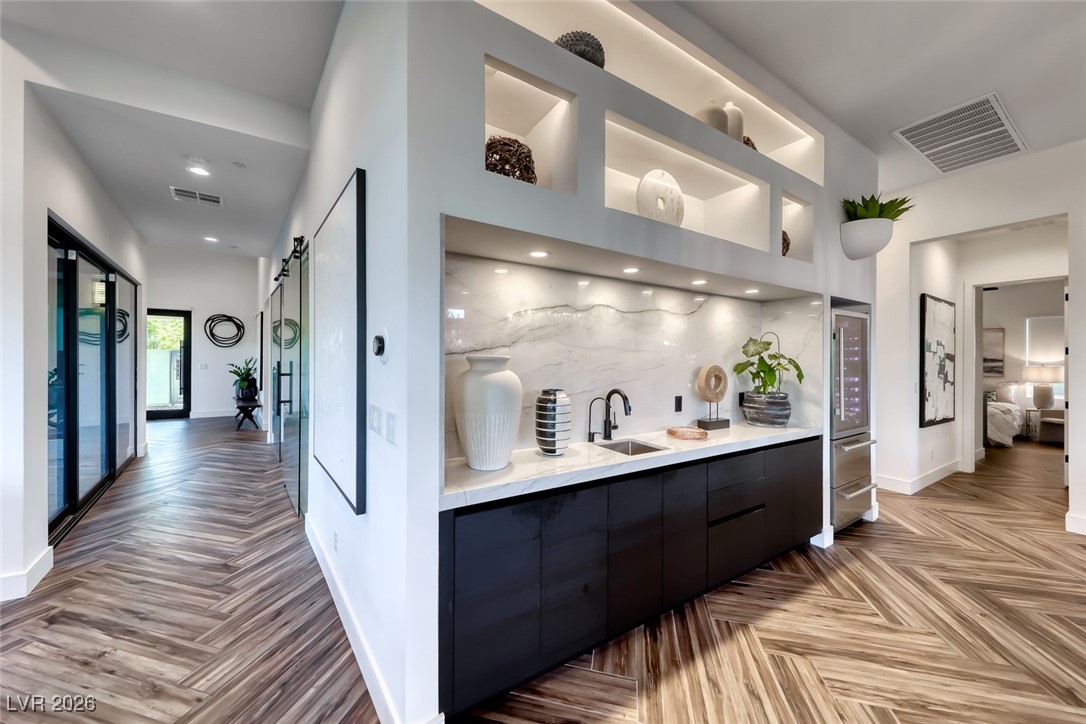 2216 Sky Pointe Ridge Drive Henderson, NV 89052 - Photo 28 of 79 HUE color changing LED lights for the bar and gym spaces