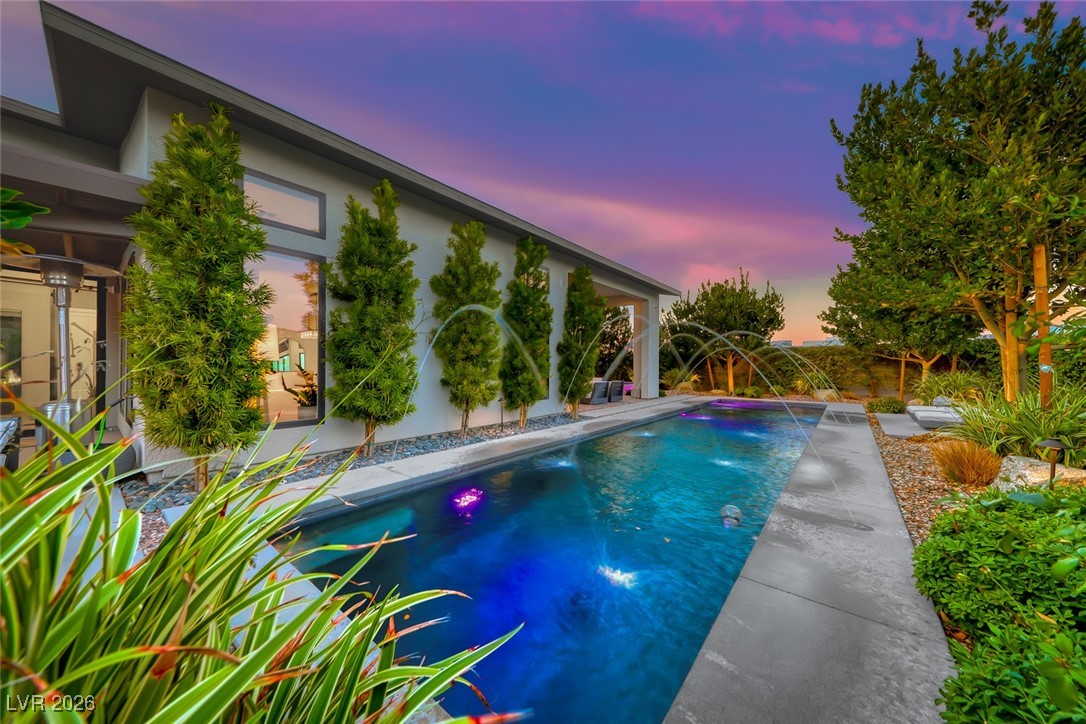 2216 Sky Pointe Ridge Drive Henderson, NV 89052 - Photo 53 of 79 PENTAIR pool equipment with Screen Logic Remote, Deck Jet Water Features and Spa Scuppers