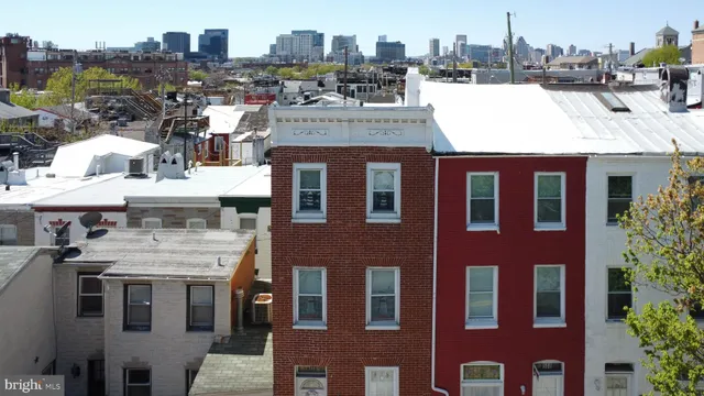 a view of residential houses with a terrace