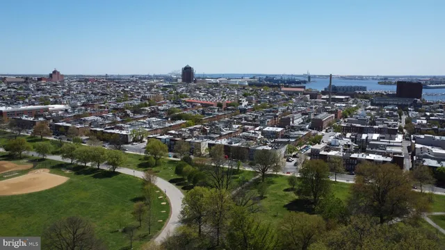 an aerial view of a city with lots of residential buildings