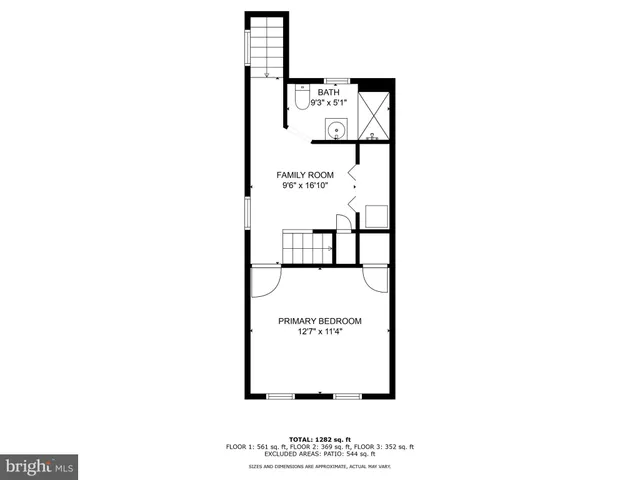 a picture of a bench in front of a wall