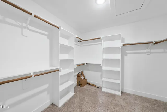 a room with closet and a window