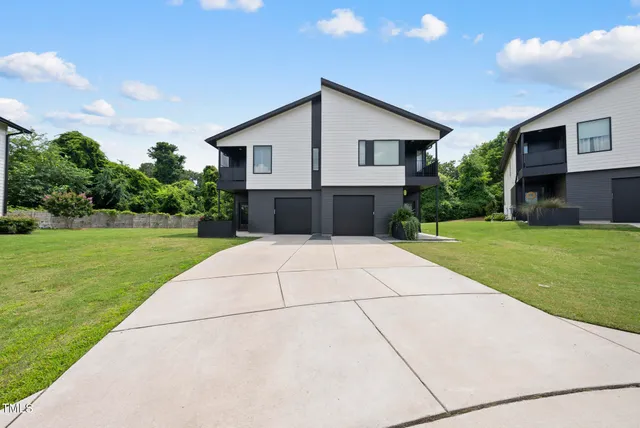 a front view of house with yard