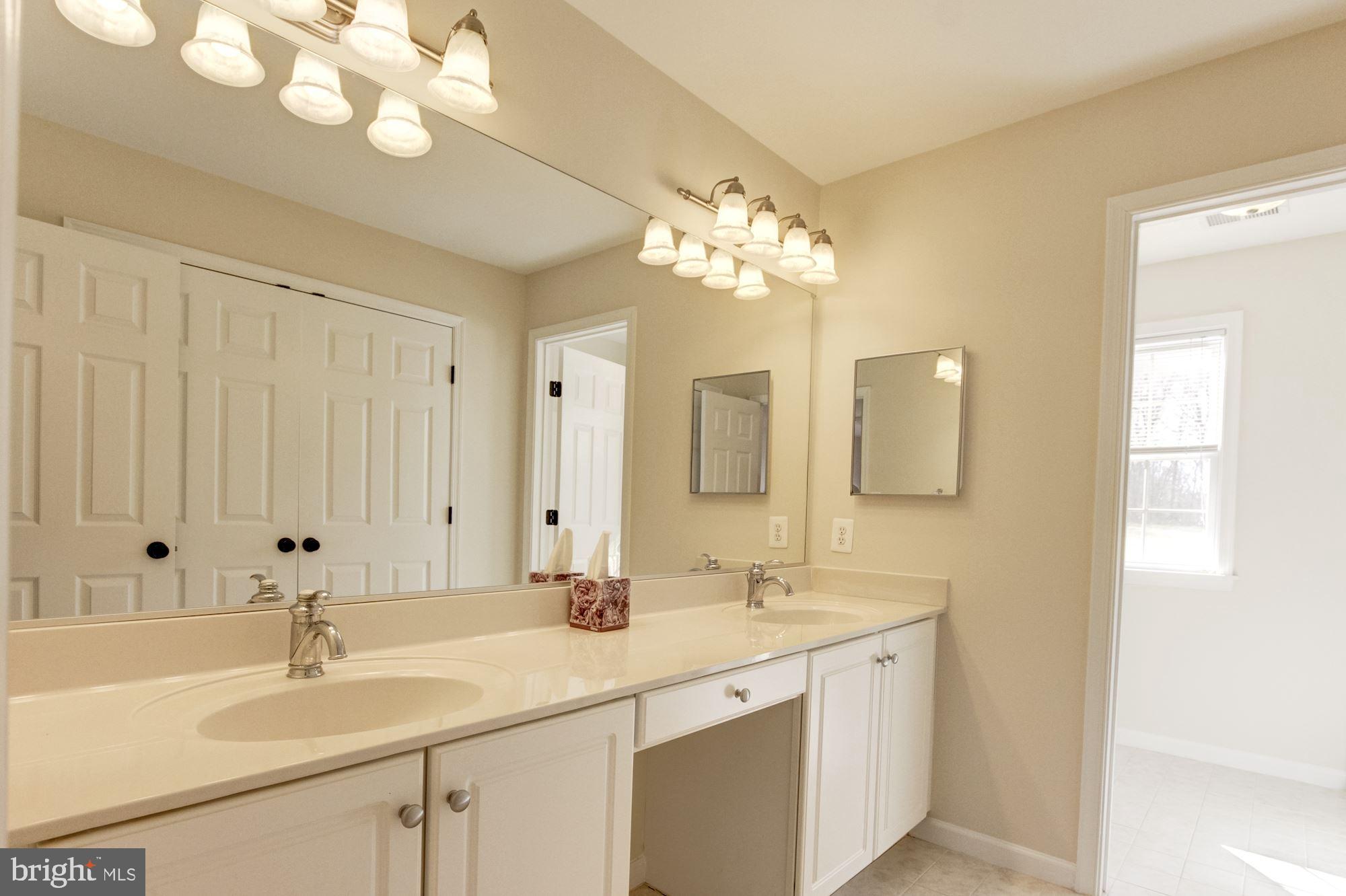 689 West Watersville Road Mount Airy, MD 21771 - Photo 32 of 50 UPPER LEVEL HALL BATHROOM WITH DUAL VANITY