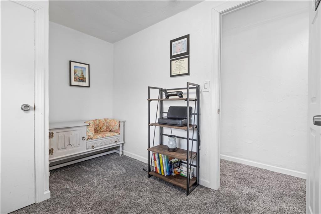 333 Frazier Drive Pittsburgh, PA 15235 - Photo 19 of 22 a living room with furniture and a baby crib