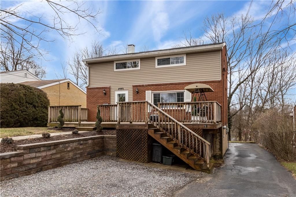 333 Frazier Drive Pittsburgh, PA 15235 - Photo 2 of 22 a view of a house with a wooden deck