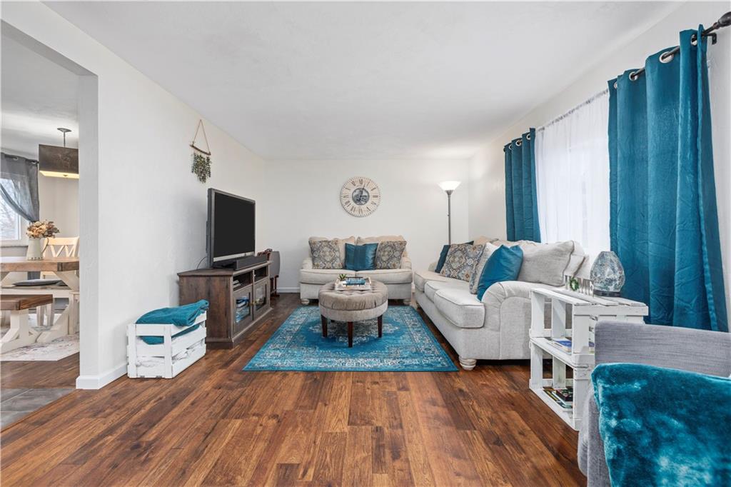 333 Frazier Drive Pittsburgh, PA 15235 - Photo 4 of 22 a living room with furniture and a flat screen tv