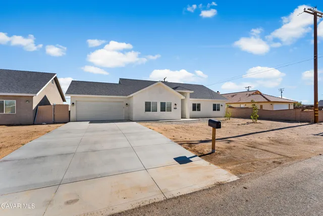 a view of a house with a patio