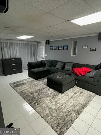 a living room with furniture and a couch
