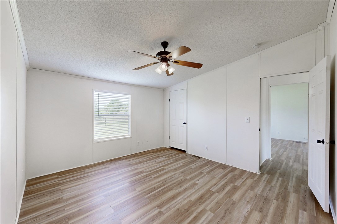 11459 Winstead Lane Calvert, TX 77837 - Photo 17 of 37 a view of an empty room with a window