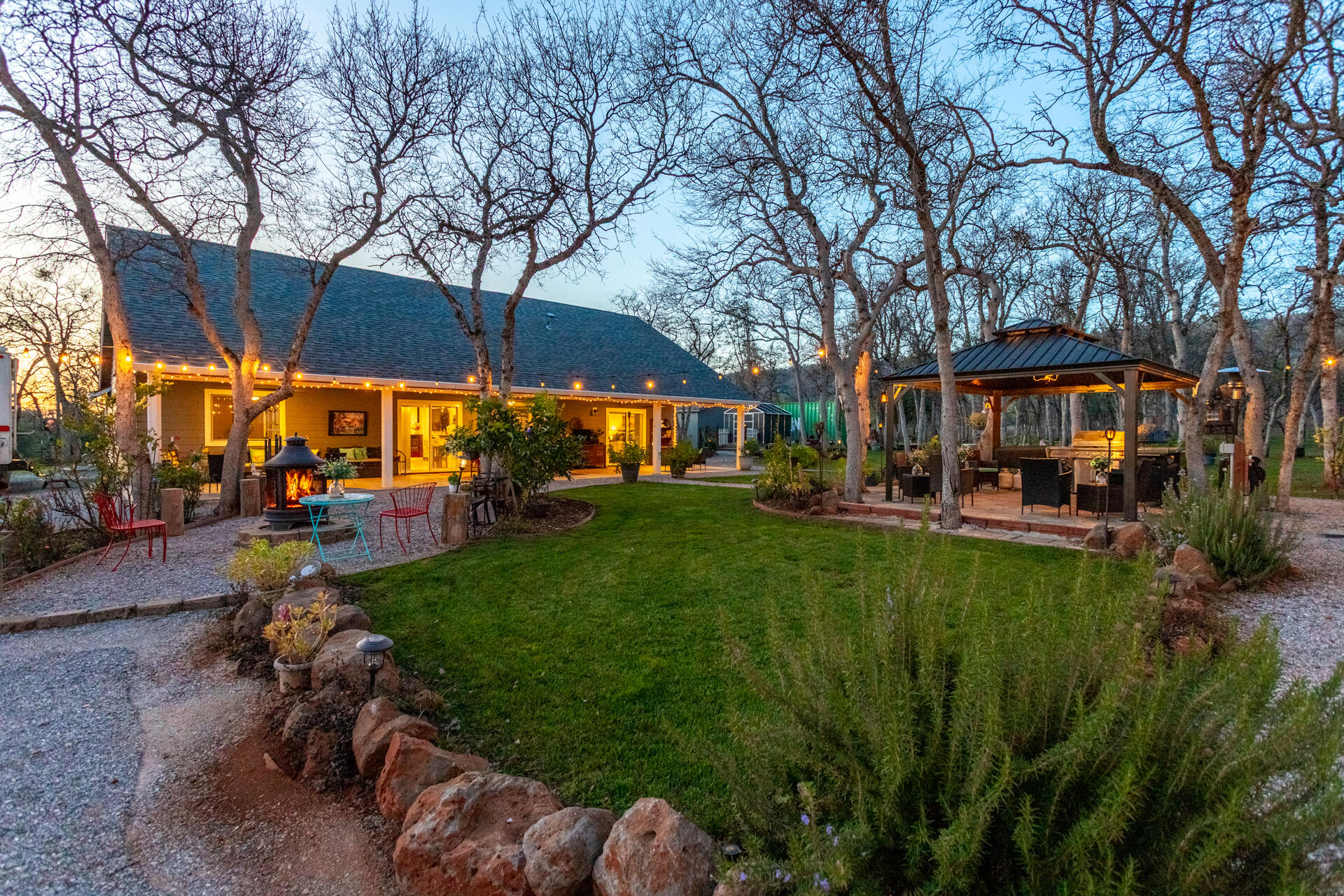 5511 Wilson Hill Road Manton, CA 96059 - Photo 1 of 71 a view of a yard with plants and large trees