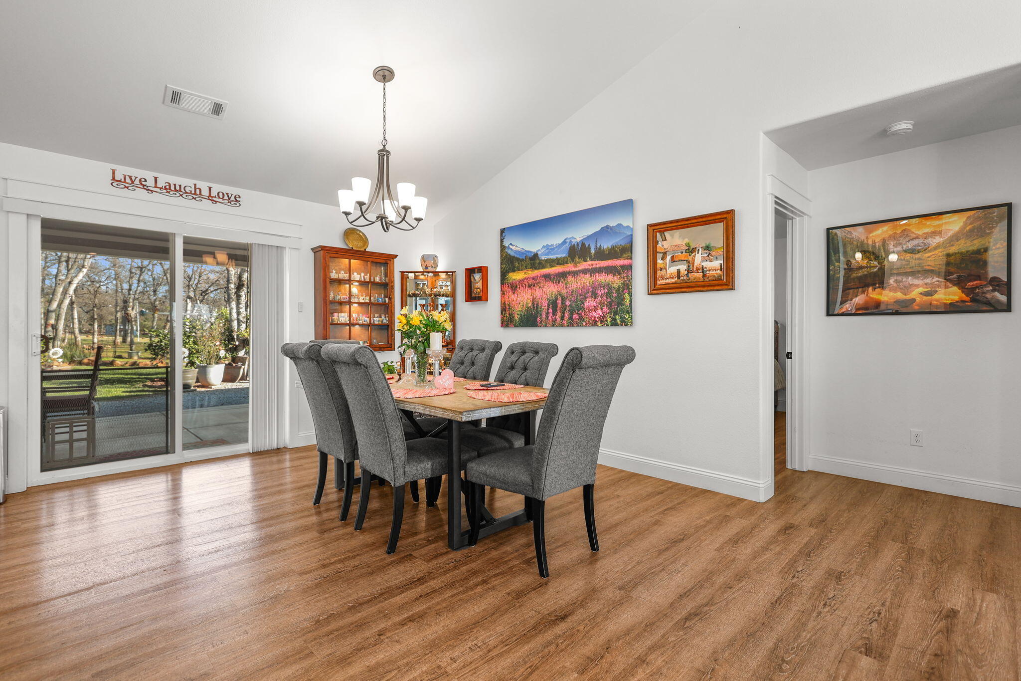 5511 Wilson Hill Road Manton, CA 96059 - Photo 12 of 71 a view of a dining room with furniture wooden floor and chandelier