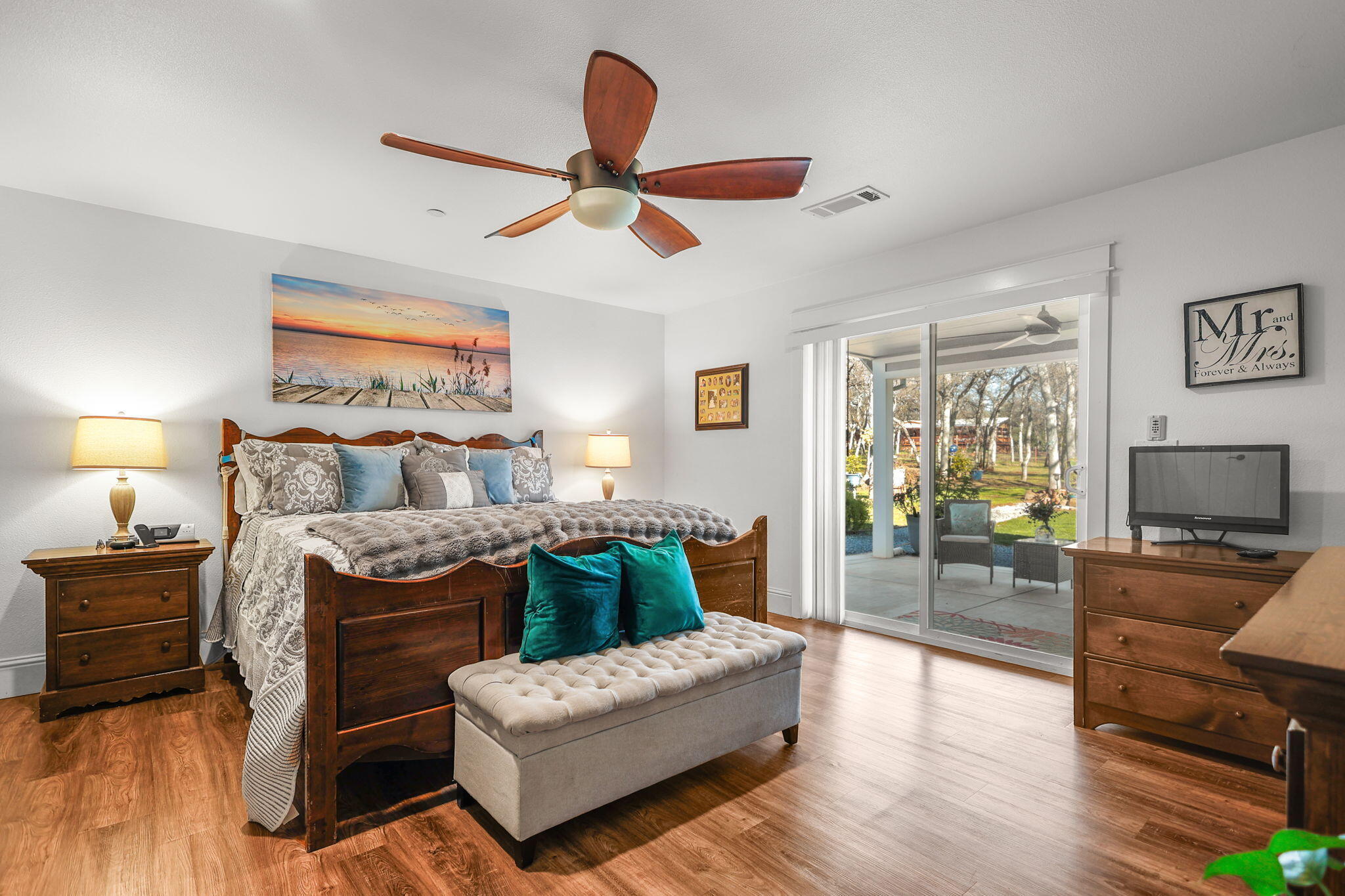 5511 Wilson Hill Road Manton, CA 96059 - Photo 15 of 71 a bedroom with a bed a couch and dresser