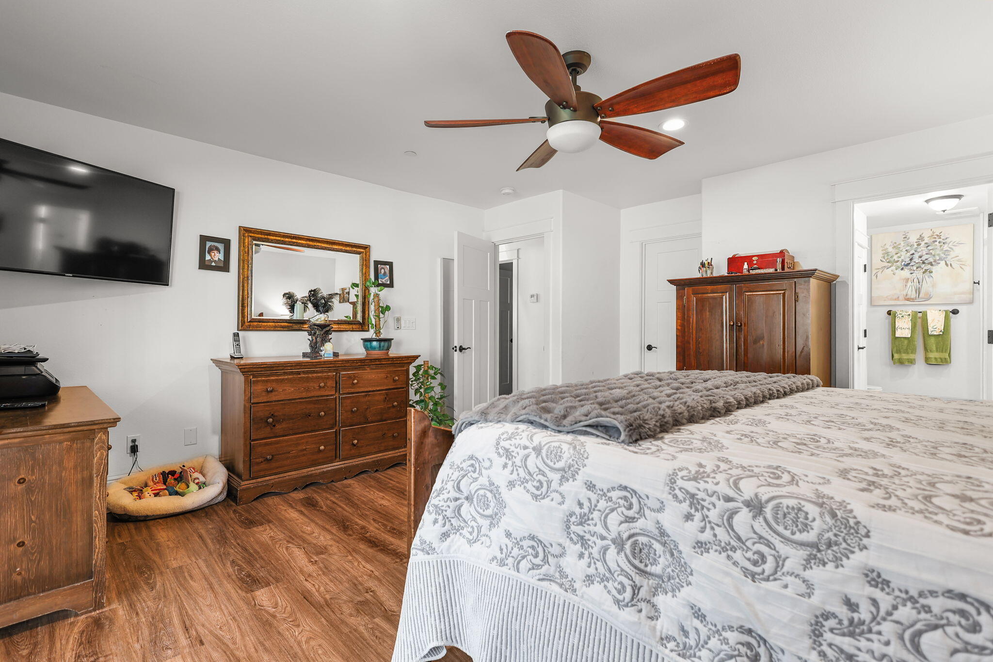 5511 Wilson Hill Road Manton, CA 96059 - Photo 16 of 71 a bedroom with a bed and a flat screen tv