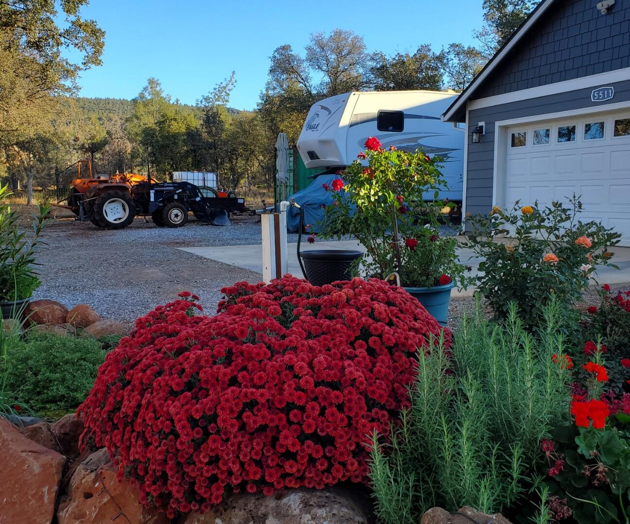 5511 Wilson Hill Road Manton, CA 96059 - Photo 31 of 71 a front view of a house with a yard and garage