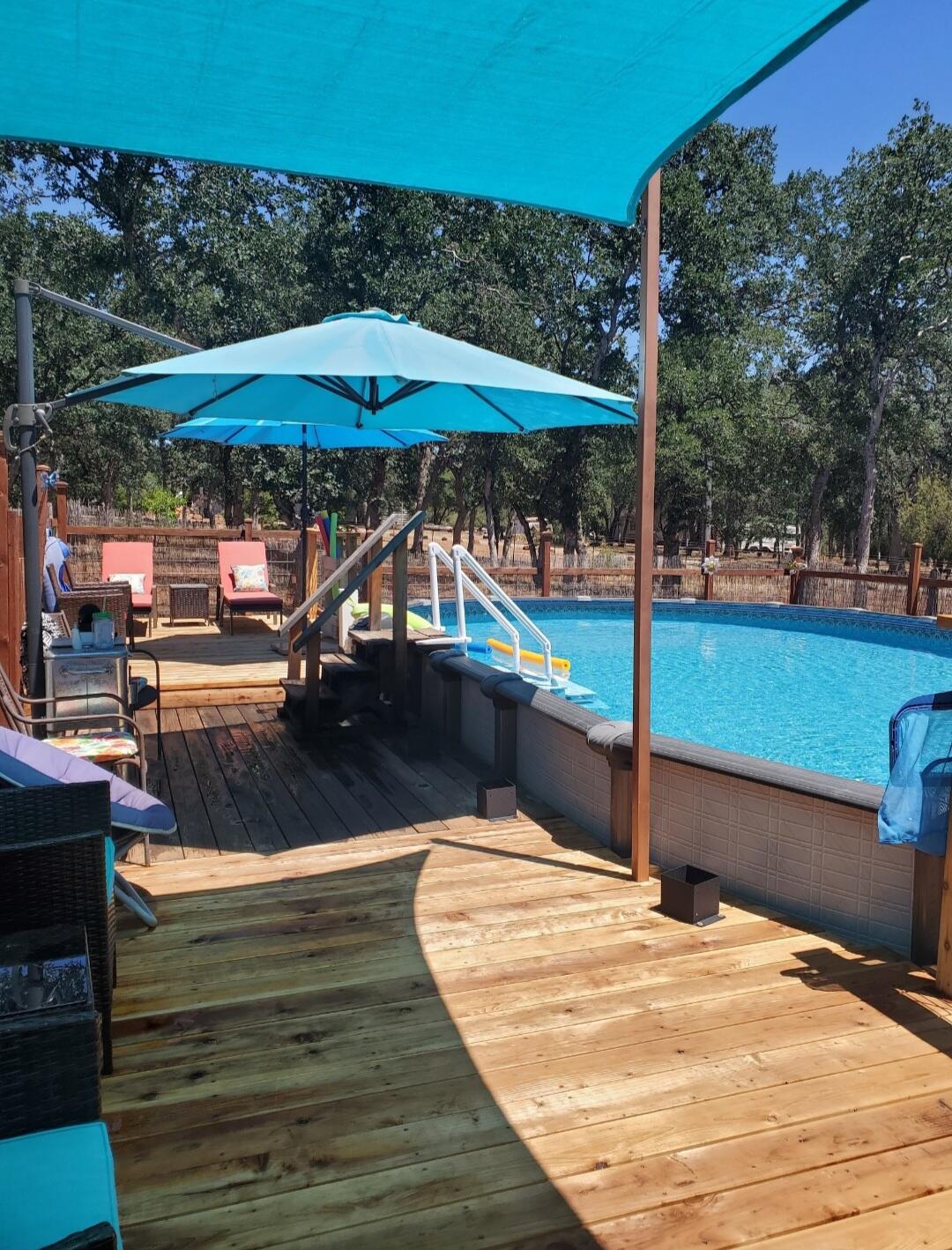 5511 Wilson Hill Road Manton, CA 96059 - Photo 36 of 71 a view of swimming pool with a patio