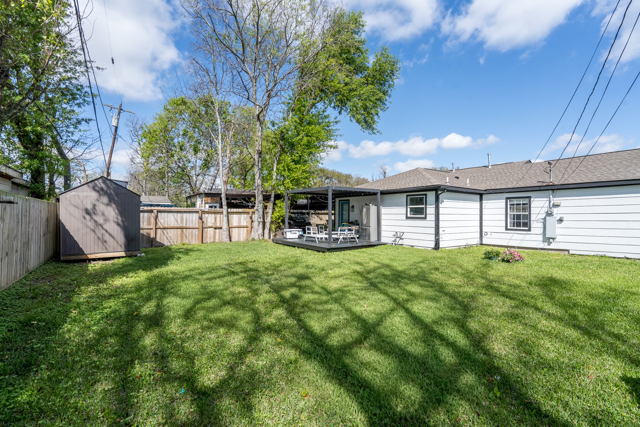 810 Jerry Street Houston, TX 77022 - Photo 19 of 20 Immense backyard with a covered patio and a storage shed. Great for entertaining or just relaxing to enjoy the outdoor space!