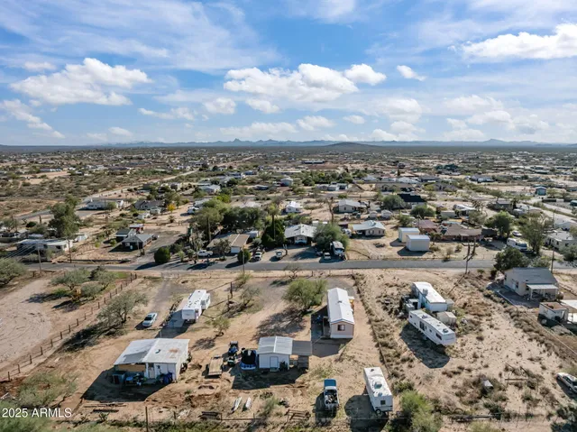 an aerial view of residential building with parking space