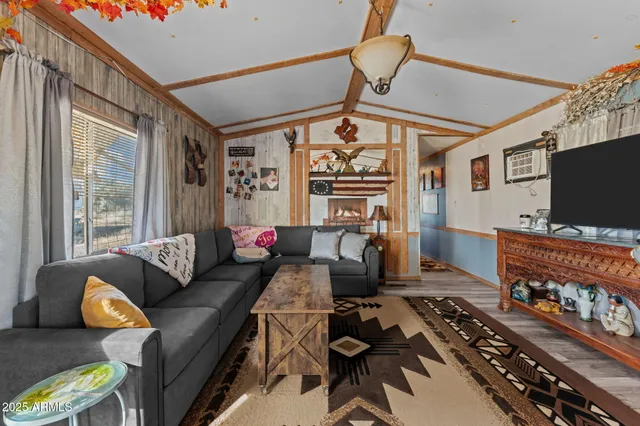 a open kitchen with stainless steel appliances granite countertop a stove and refrigerator