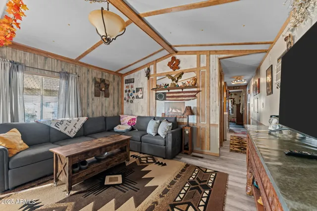 a view of a kitchen with furniture and a window