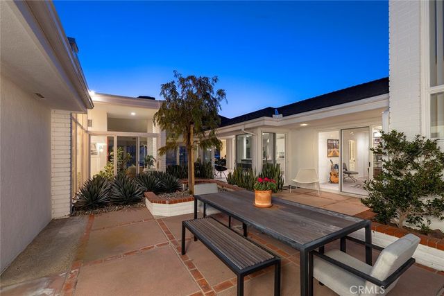 a view of a terrace with furniture