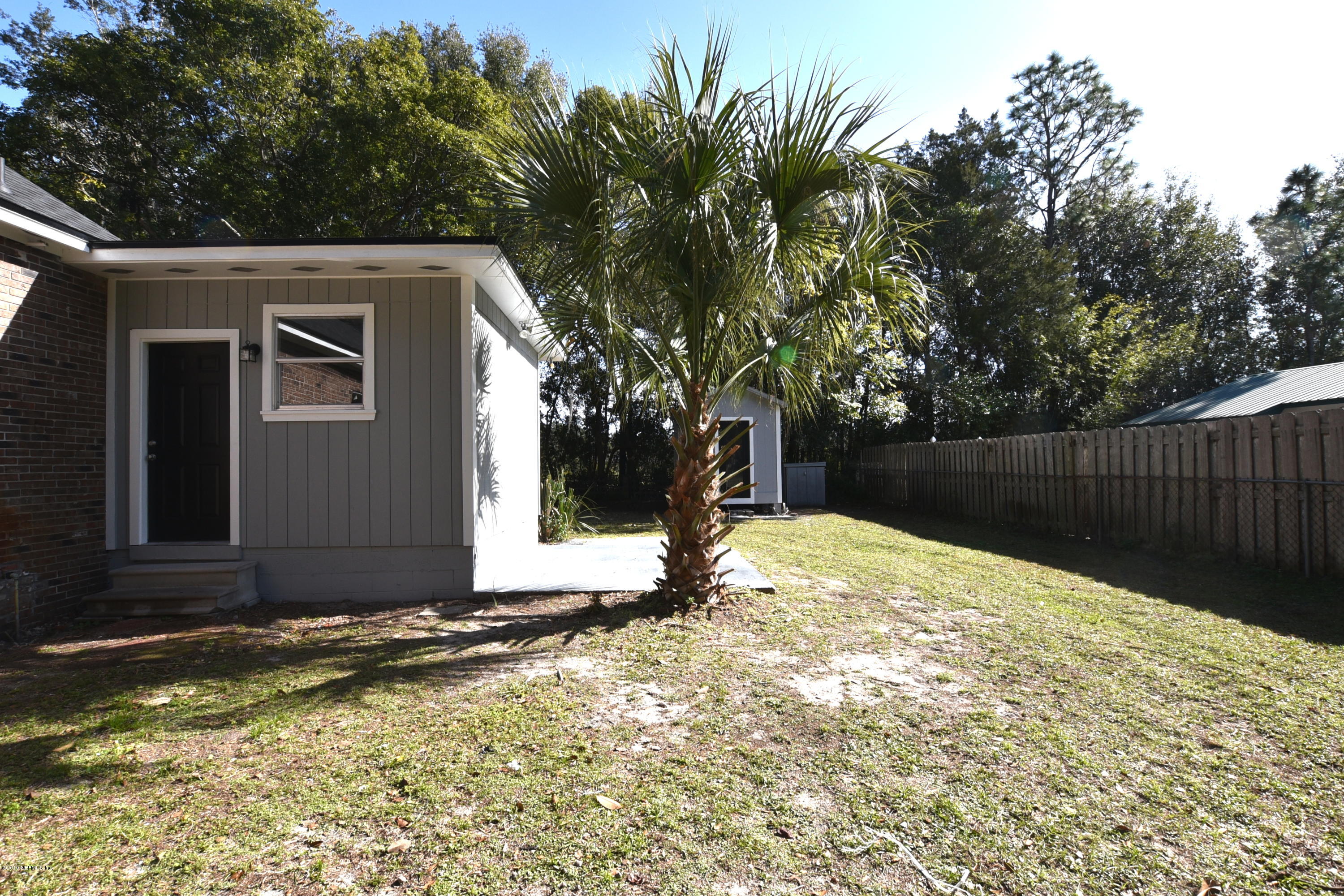 12425 Knotah Road Jacksonville, FL 32258 - Photo 27 of 28 Side yard with shed