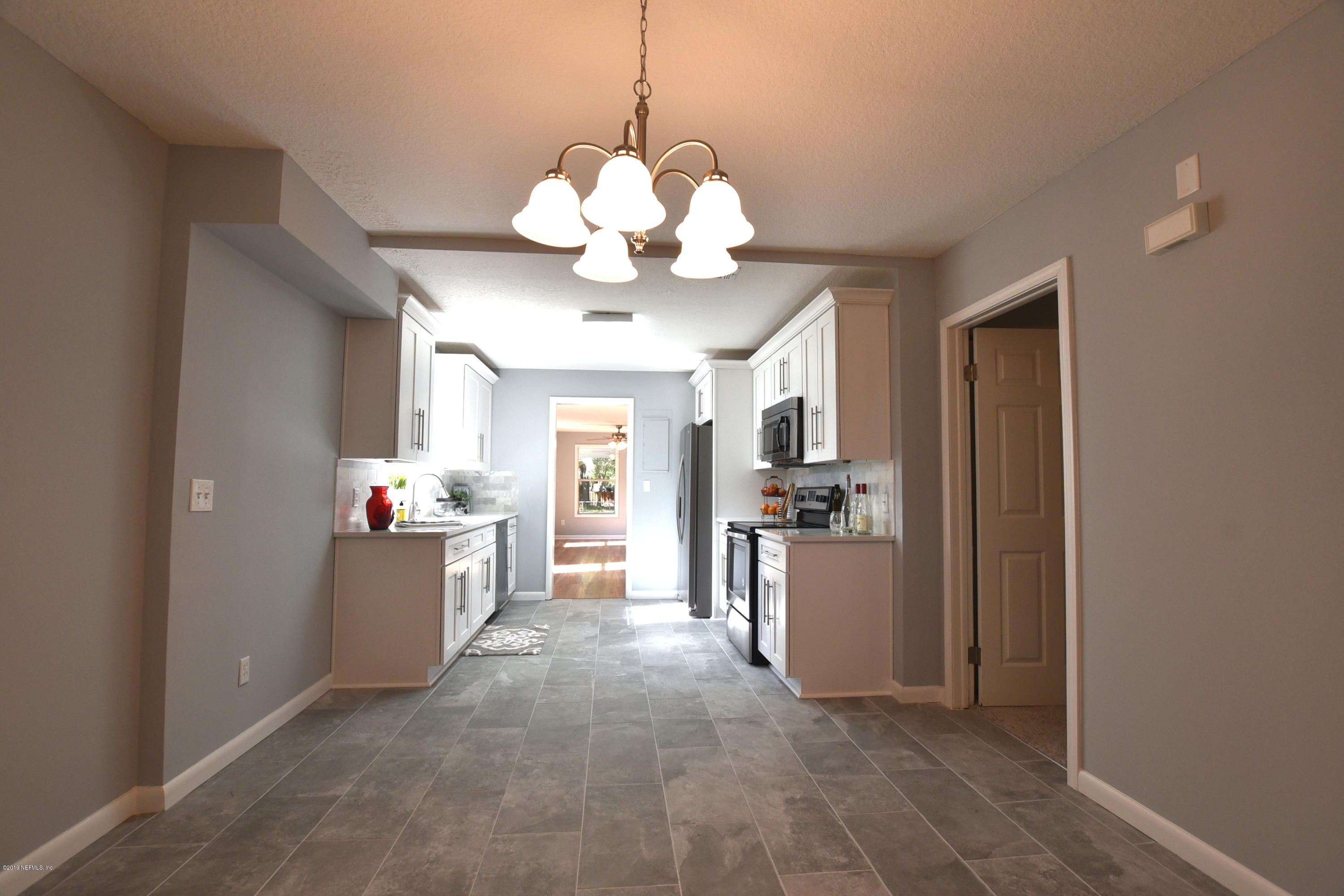 12425 Knotah Road Jacksonville, FL 32258 - Photo 8 of 28 Kitchen and Dining