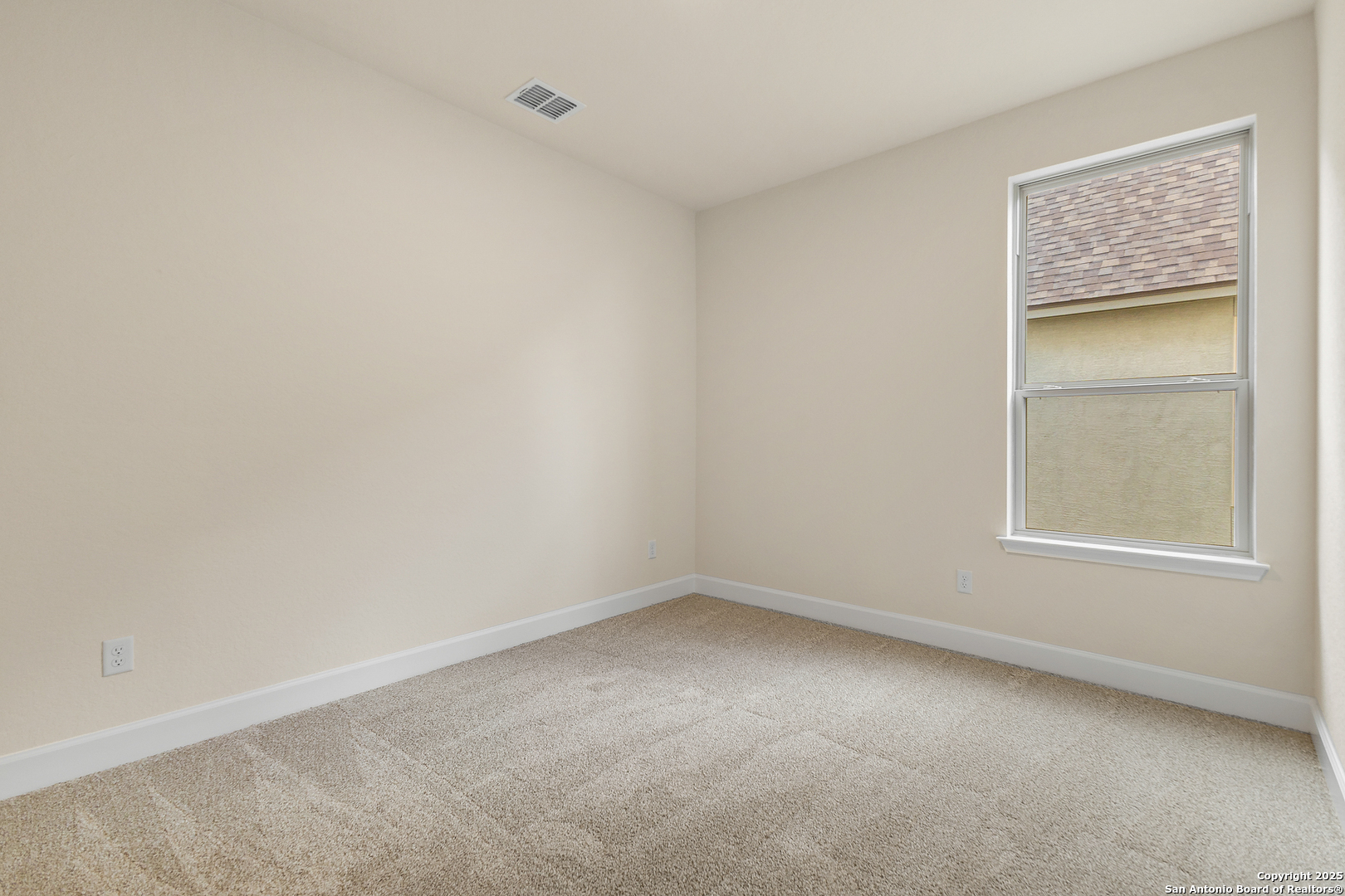 1716 Durham Bulverde, TX 78163 - Photo 24 of 42 an empty room with a window