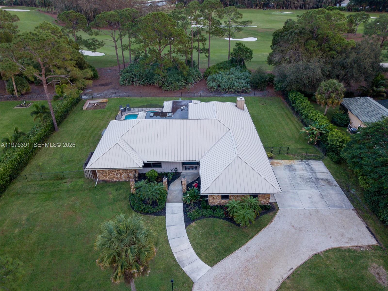 1872 Southeast Colony Way Jupiter, FL 33478 - Photo 10 of 26 an aerial view of a house