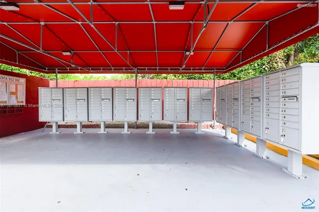 a view of cars parked in front of a building