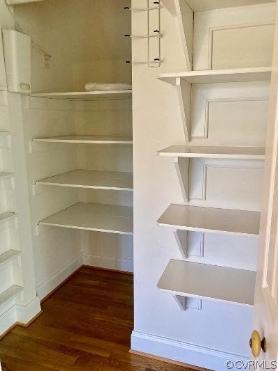 13019 Chipstead Road Chester, VA 23831 - Photo 11 of 23 a view of walk in closet with empty racks