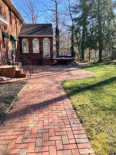 13019 Chipstead Road Chester, VA 23831 - Photo 22 of 23 a front view of a house with a yard