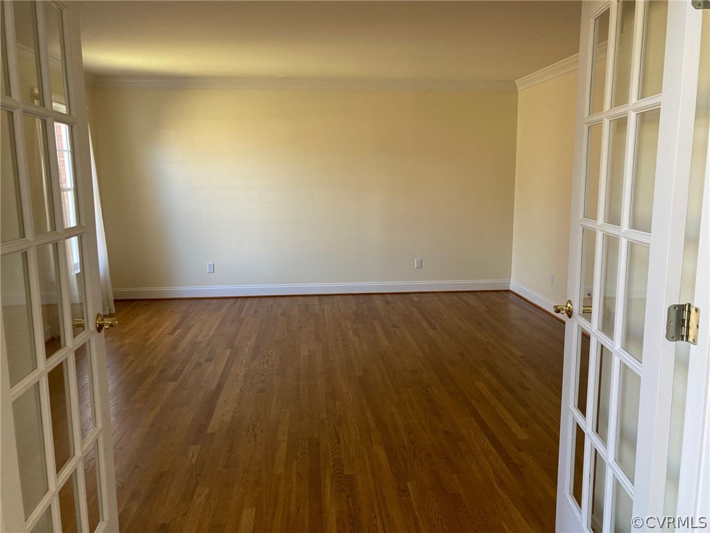 13019 Chipstead Road Chester, VA 23831 - Photo 4 of 23 a view of room with wooden floor and window