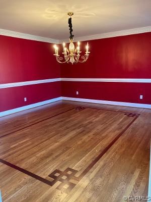 13019 Chipstead Road Chester, VA 23831 - Photo 5 of 23 a view of a chandelier with a dining table
