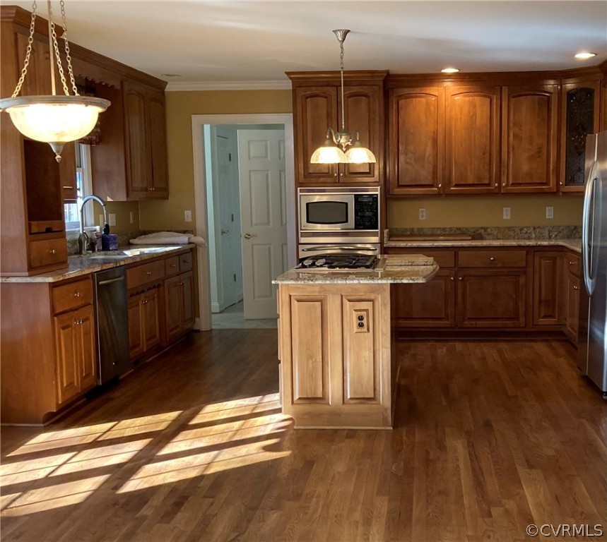 13019 Chipstead Road Chester, VA 23831 - Photo 9 of 23 a kitchen with a stove a sink and a microwave
