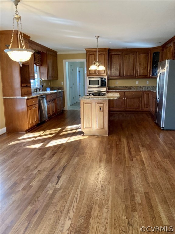 13019 Chipstead Road Chester, VA 23831 - Photo 10 of 23 a kitchen with stainless steel appliances a stove a refrigerator and a sink