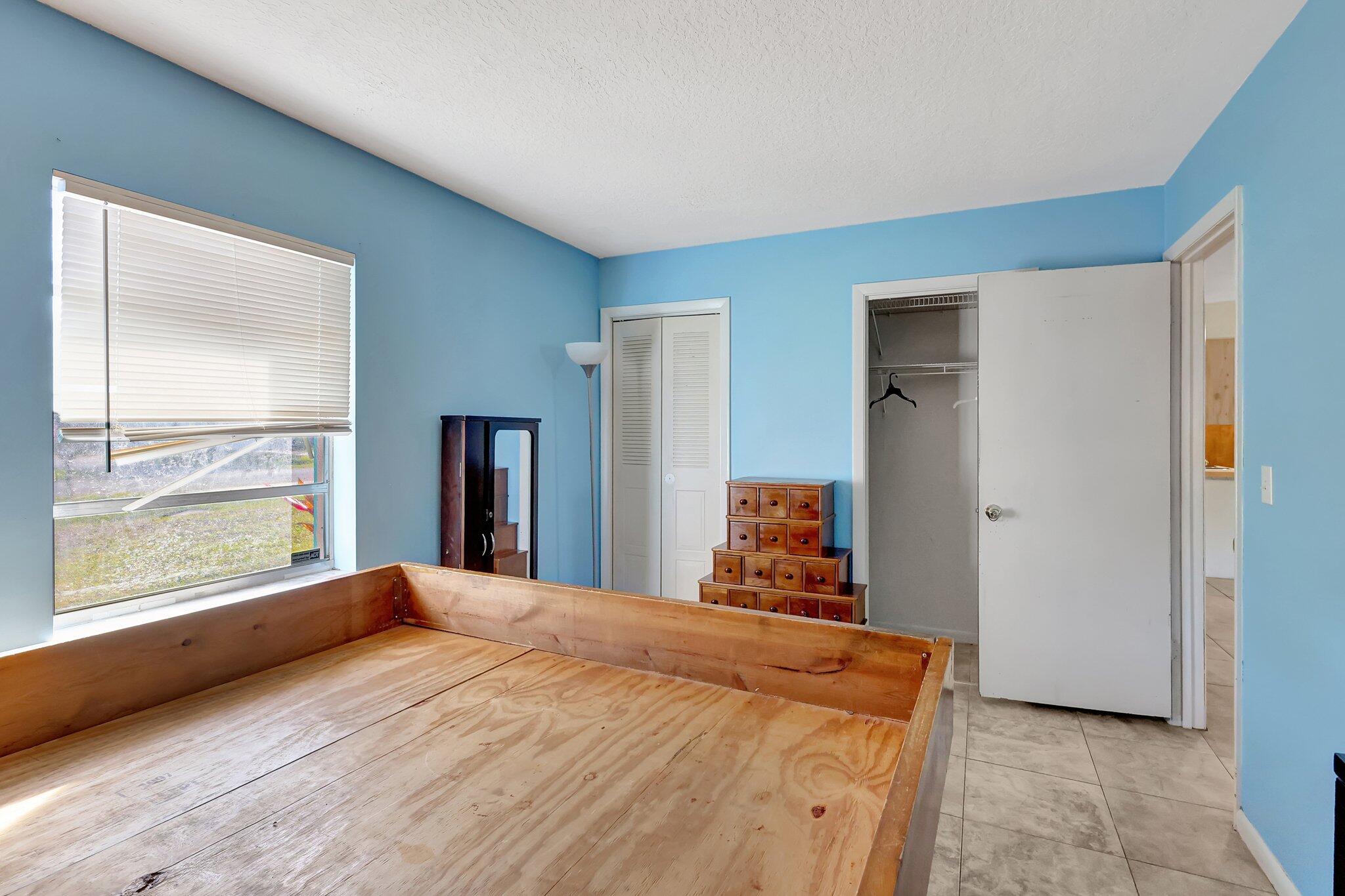 7406 Donlon Road Fort Pierce, FL 34951 - Photo 14 of 40 Master Bedroom