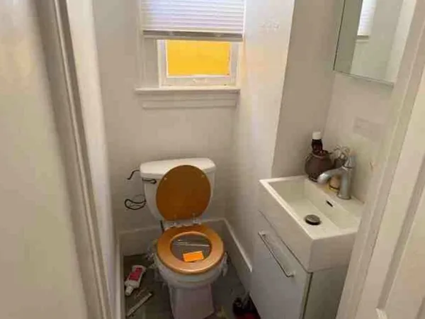 a view of an empty room with a window