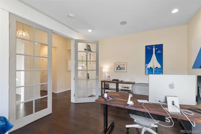 a workspace with furniture and window