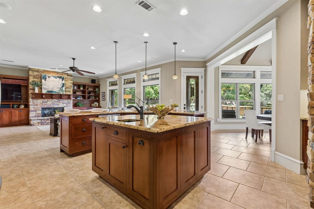 206 Rodeo Drive Azle, TX 76020 - Photo 13 of 40 Open concept kitchen with windows to the backyard