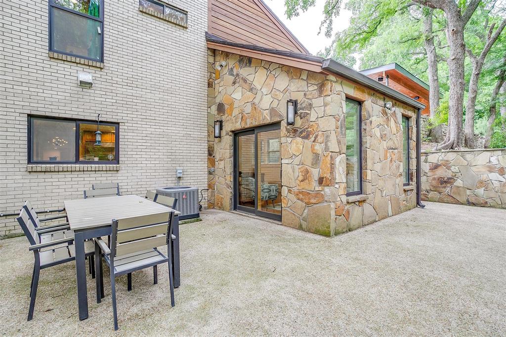 4100 Inwood Road Fort Worth, TX 76109 - Photo 11 of 40 a view of a patio with a table and chairs