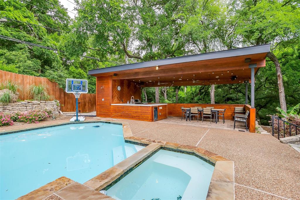 4100 Inwood Road Fort Worth, TX 76109 - Photo 32 of 40 a backyard of a house with barbeque oven table and chairs