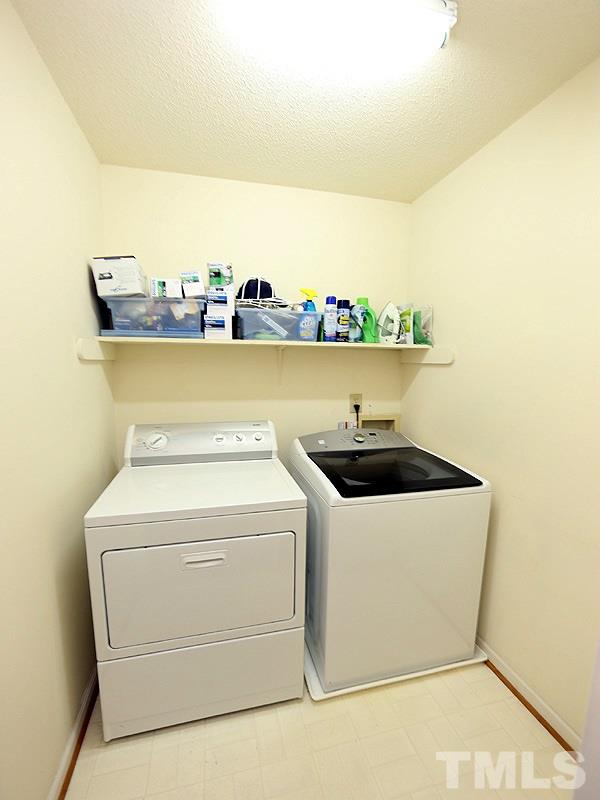 2009 Hamrick Drive Raleigh, NC 27615 - Photo 21 of 25 2nd Floor Laundry convenient to the 3 Bedrooms
