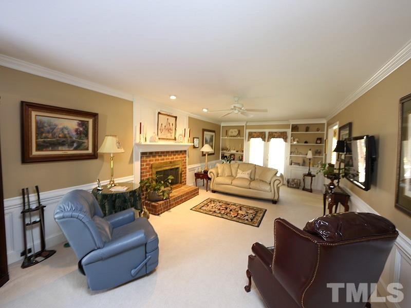 2009 Hamrick Drive Raleigh, NC 27615 - Photo 6 of 25 Carpeted, Crown Moldings, Wainscoting.