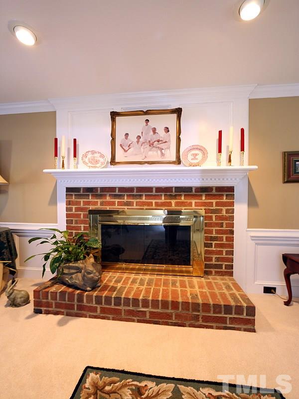 2009 Hamrick Drive Raleigh, NC 27615 - Photo 7 of 25 Brick Gas Fireplace with Recessed Lighting