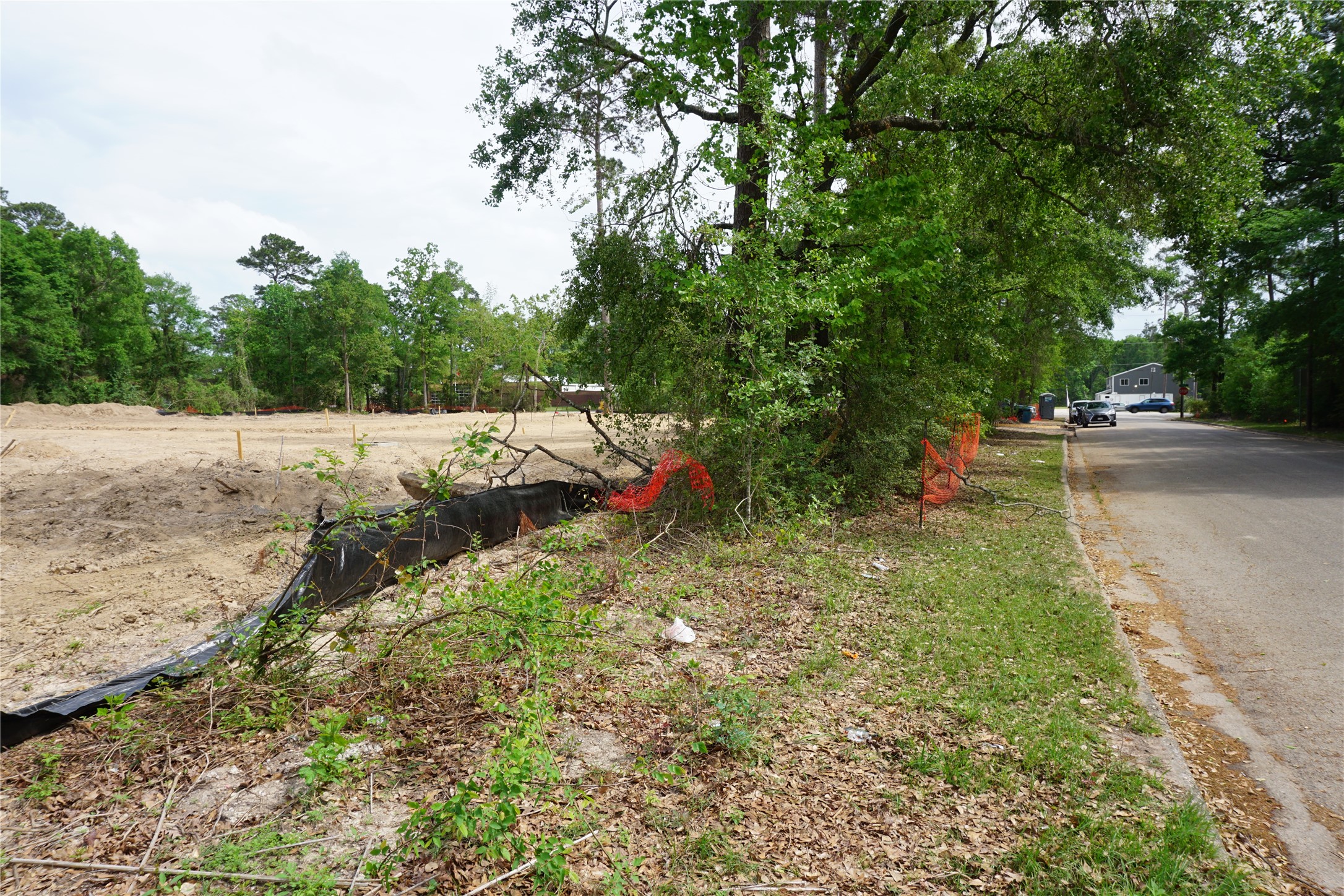 0 Foster Drive Conroe, TX 77301 - Photo 6 of 8 a backyard of a house with lots of green space