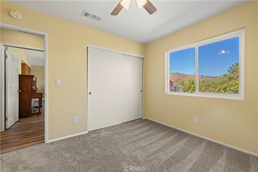 33533 Santiago Road Acton, CA 93510 - Photo 16 of 36 a view of an empty room with a window