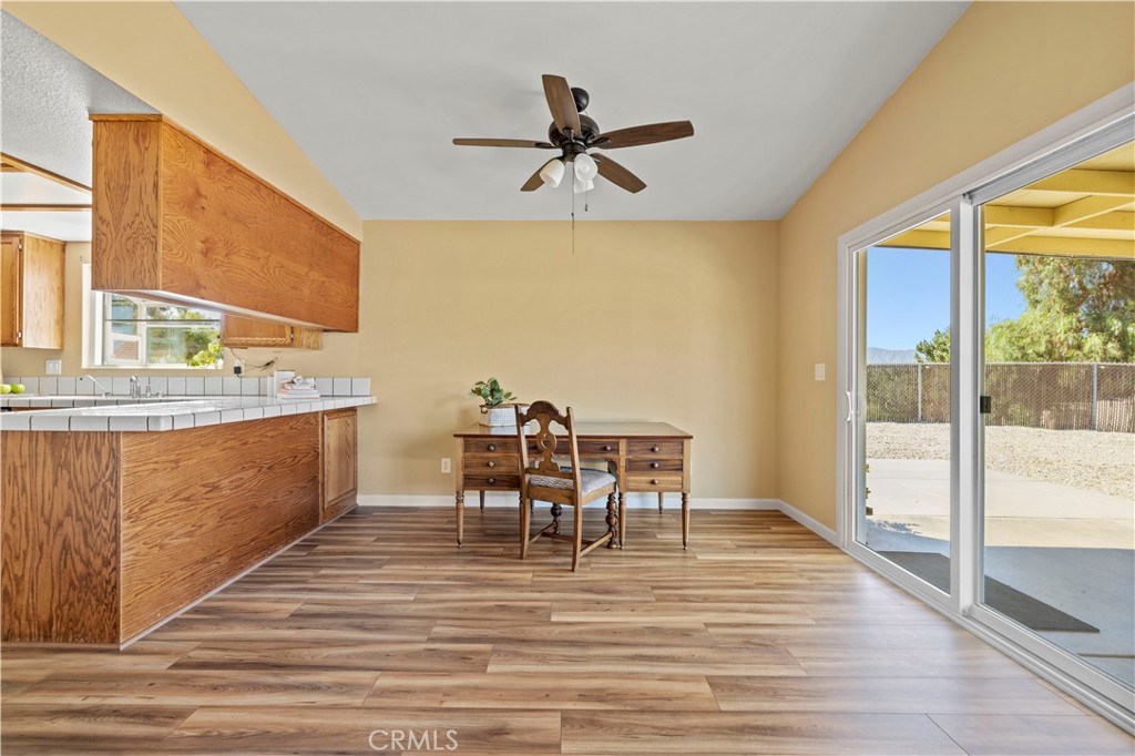 33533 Santiago Road Acton, CA 93510 - Photo 9 of 36 a view of a dining room with furniture window and wooden floor