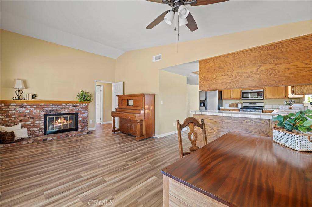 33533 Santiago Road Acton, CA 93510 - Photo 10 of 36 a living room with furniture and a fireplace